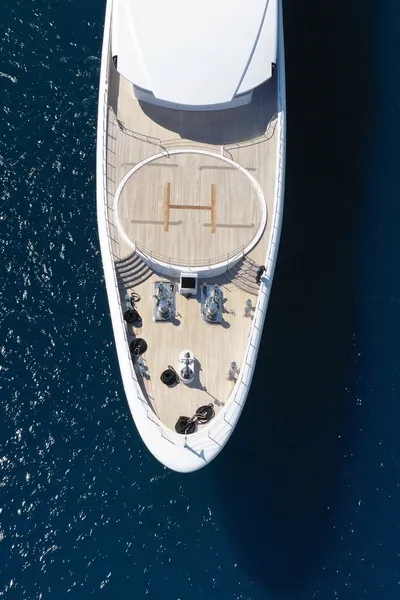 Aerial view of large yacht with helipad