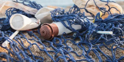Fishing net with rubbish caught inside