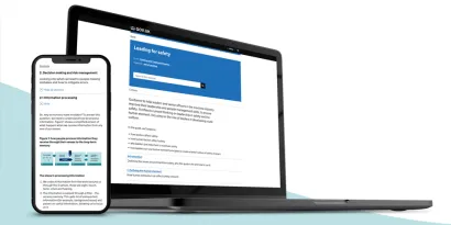 Laptop and phone displaying the Leading for Safety publication