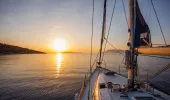 Small ship yacht at sunset